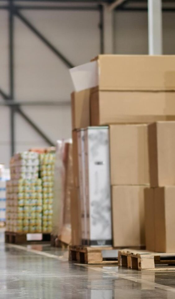 woman-safety-helmet-walking-warehouse_259150-56937